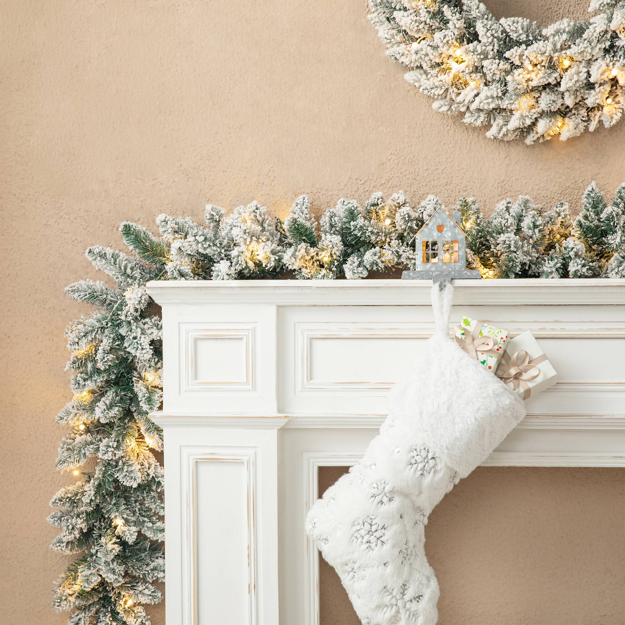 Glitzhome® 6ft. Pre-Lit Snow Flocked Christmas Garland, 2ct.